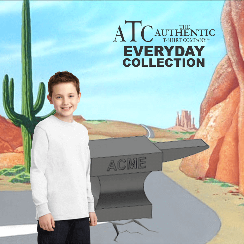Smiling boy wearing a plain white long-sleeve shirt from The Authentic T-Shirt Company's Everyday Collection, standing in front of a cartoon desert landscape with an anvil labeled ACME