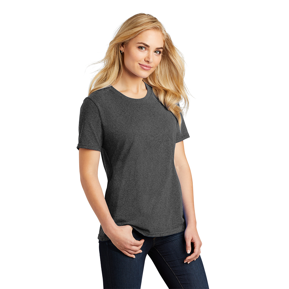 Blonde woman with long hair wearing a plain dark gray short-sleeve t-shirt and dark jeans, posing against a white background with one hand in her pocket