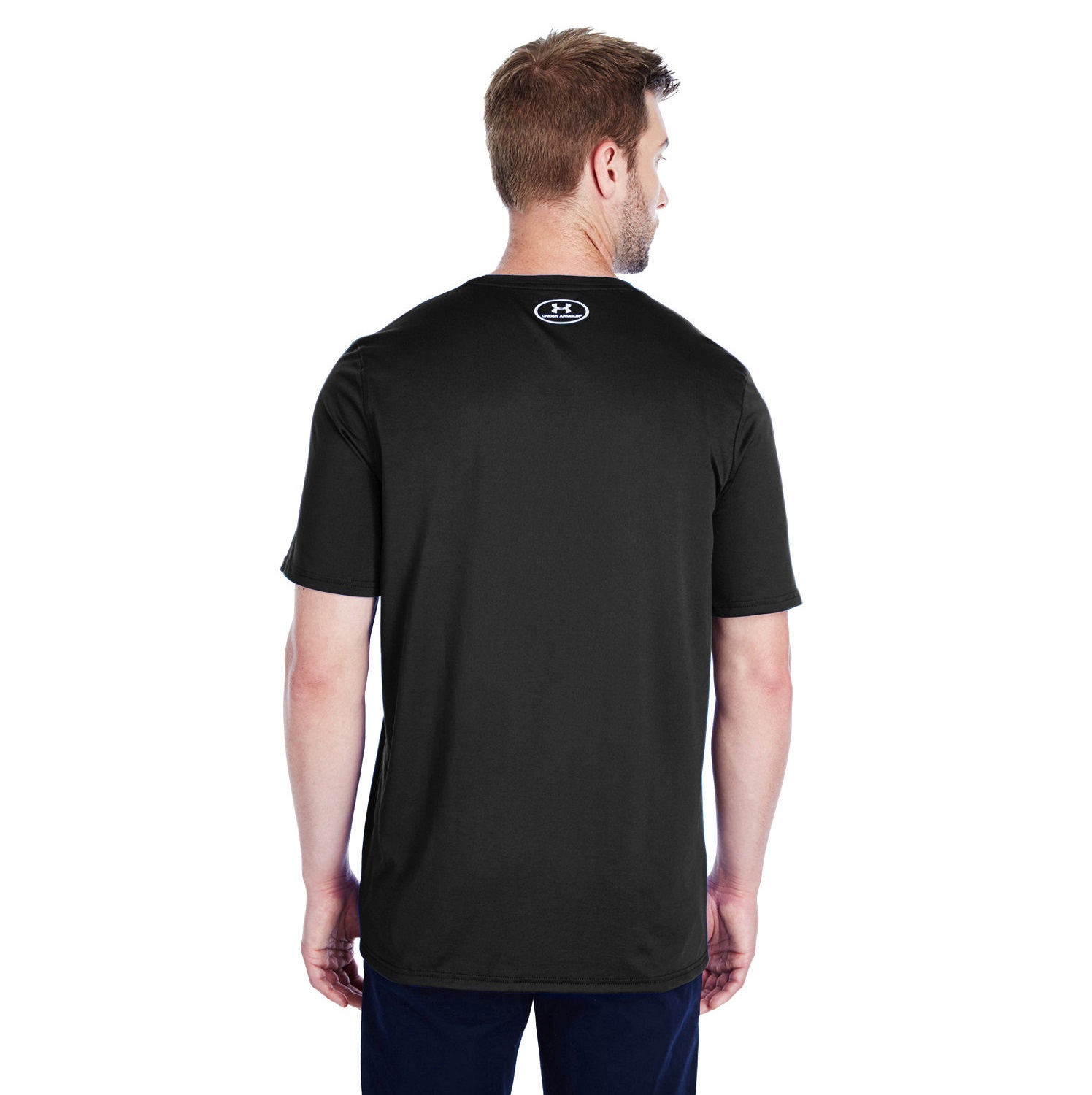 Rear view of a man wearing a black Under Armour T-shirt with a small white logo at the top center back, standing against a white background.