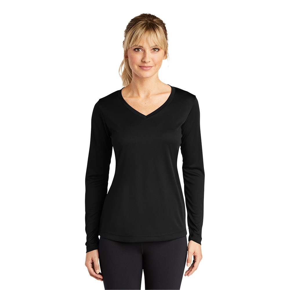 Woman wearing a black long-sleeve V-neck athletic top with fitted sleeves and a smooth fabric finish