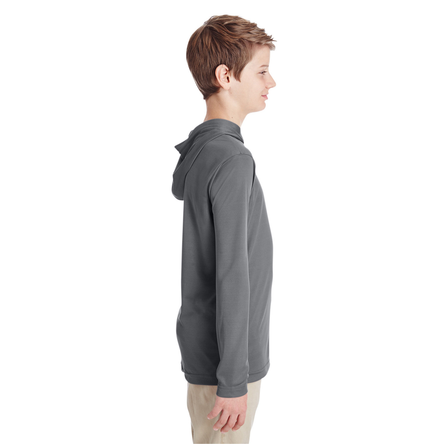 Side profile of a teenager wearing a gray hooded pullover and beige pants against a plain white background.