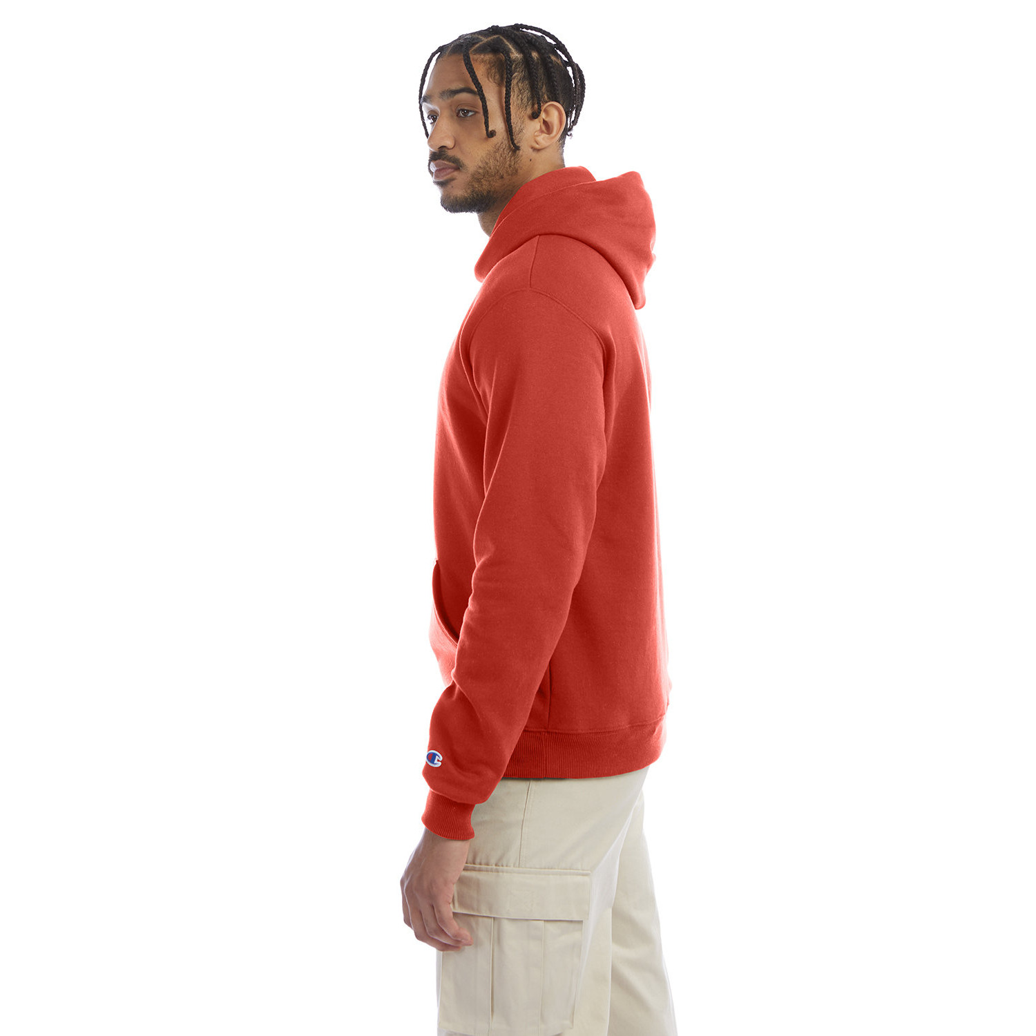 champion_hood_cover_side Side view of a man wearing a red hoodie and beige cargo pants against a plain white background.