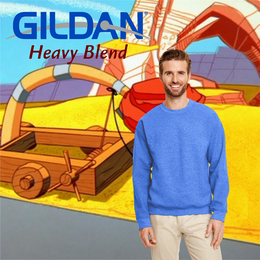 gilda_crewneck_sweatshirt_cover Man wearing a blue Gildan Heavy Blend sweatshirt standing in front of a colorful cartoon-like background featuring wooden machinery and abstract structures.