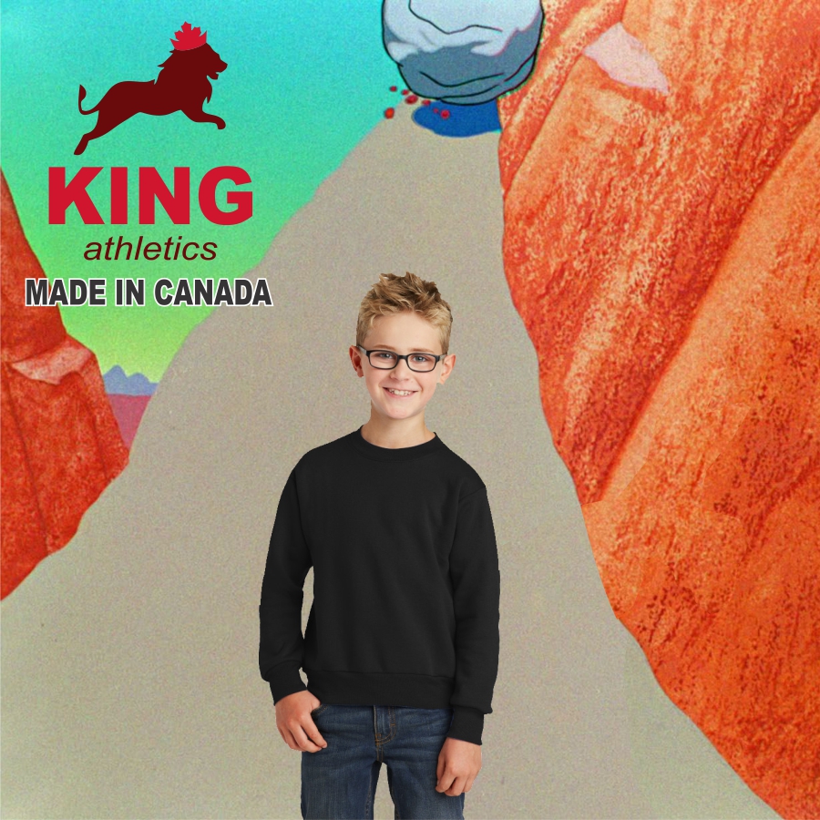 KY9010_COVER_IMAGE Smiling young boy wearing glasses, a black sweatshirt, and blue jeans standing in front of an animated canyon background with a large boulder starting to roll down and a King Athletics logo with text 'MADE IN CANADA' in the upper left corner.