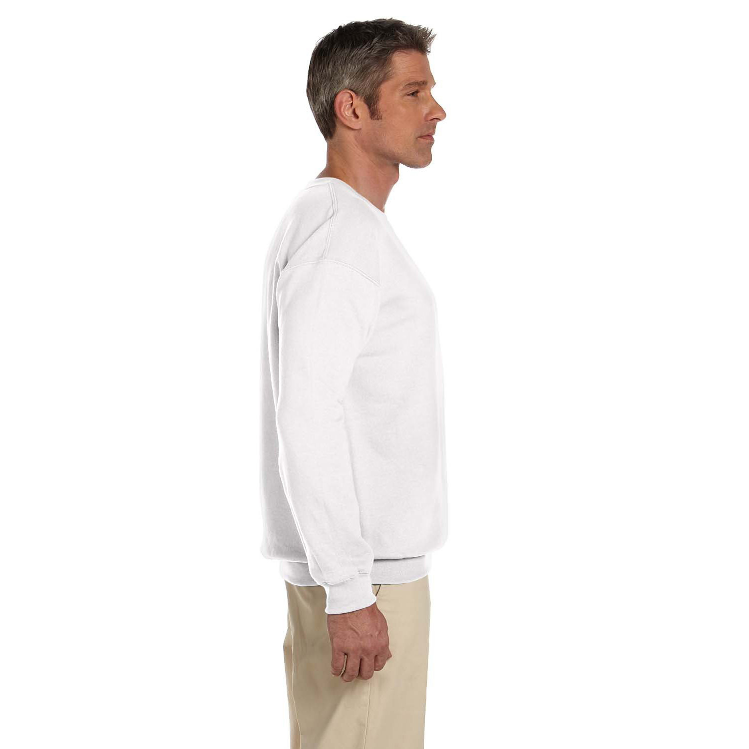 Profile view of a man wearing a plain white sweatshirt and beige pants against a white background.