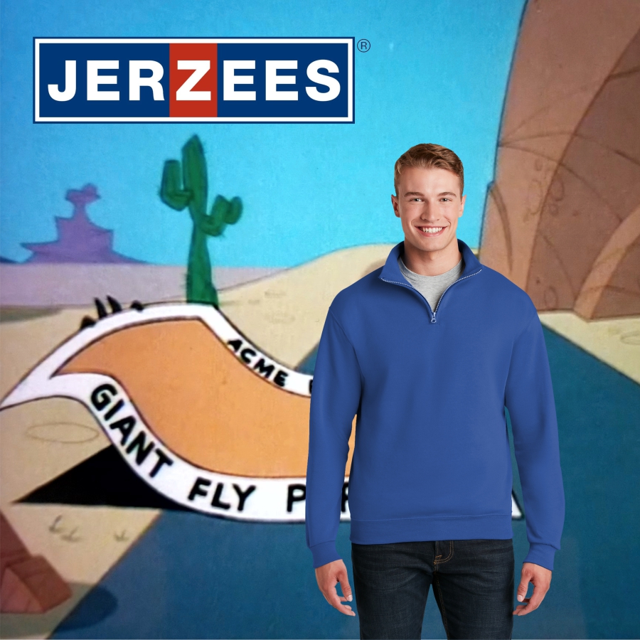 jerzees_1_4_zi[_cover Smiling man wearing a blue quarter-zip sweatshirt standing in front of a cartoon desert background with a cactus and a large ramp labeled "ACME GIANT FLY PAPER," with the Jerzees logo displayed above.
