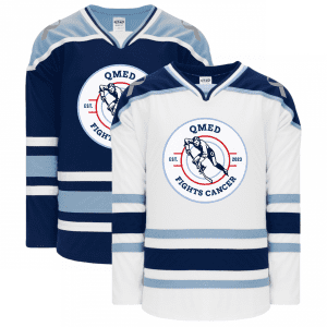Two hockey jerseys featuring the "QMED Fights Cancer" logo. One jersey is navy blue with white and light blue stripes, while the other is white with navy blue and light blue stripes. Both jerseys are designed to promote cancer awareness and support.