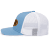 ponies_trucker_cap_side_caroliina Light blue and white mesh baseball cap with a circular brown patch featuring a baseball team logo on the front panel, viewed from the side.