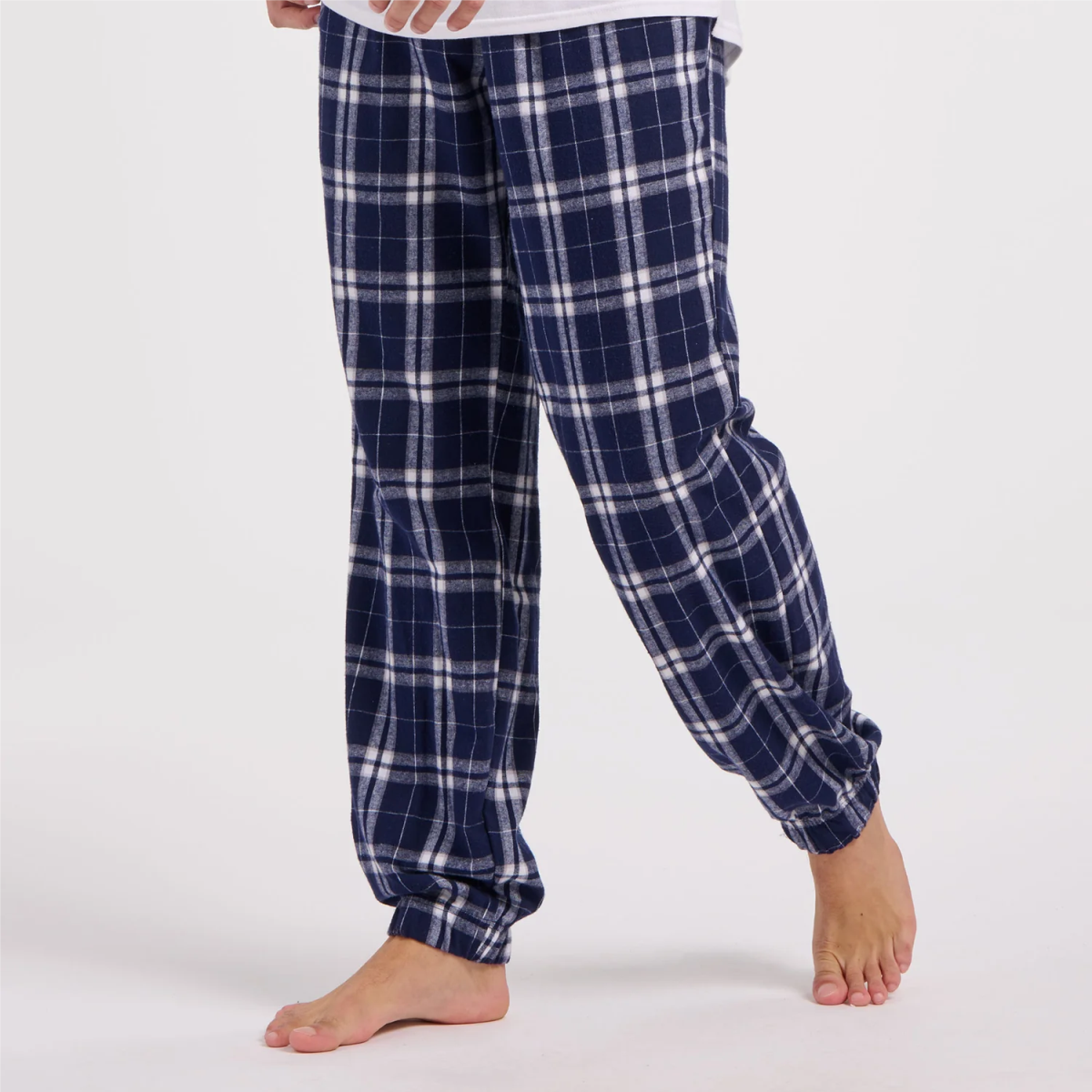 Boxercraft BM6625 1000% cotton omfortable navy blue plaid pajama pants featuring a soft fabric and elastic cuffs, ideal for lounging and relaxing at home.