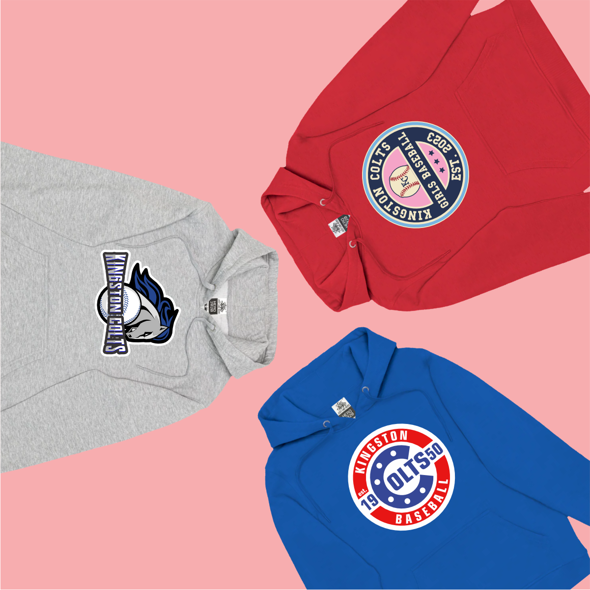 Three hoodies featuring Kingston Colts baseball designs: a gray hoodie with a logo, a red hoodie with an established date, and a blue hoodie displaying a classic baseball emblem, all set against a pink background.